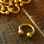 Gold Titanium Horseshoe Barbell: Internally Threaded Septum Ring (16G-00G)
